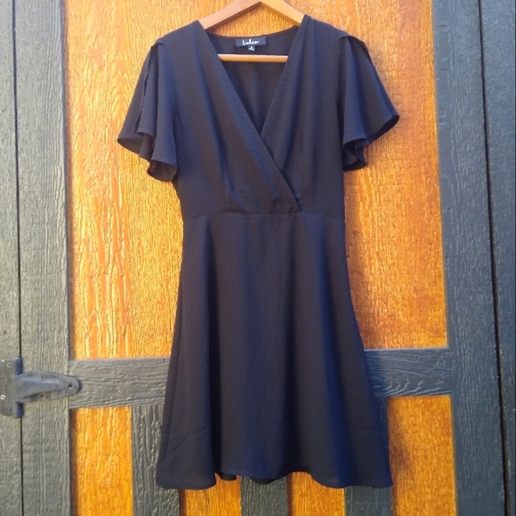 Lulus Dresses & Skirts - Lulu's Black Simple Little Ruffle Babydoll Wrap Cross Synched Dress Size Medium